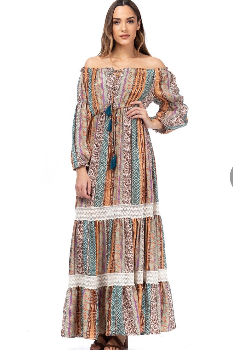 Beige printed maxi dress with elastic boat neck.